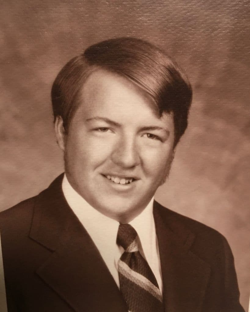 Ernest “Ernie” Brooks, a warm sepia portrait from his younger years